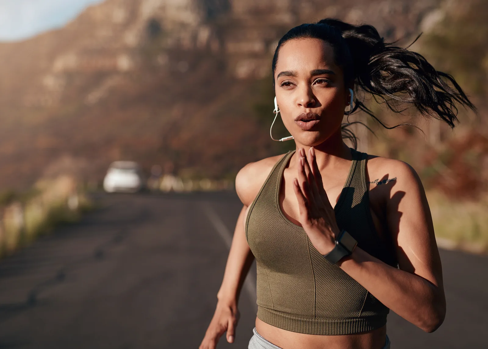 Member running on a mountain road